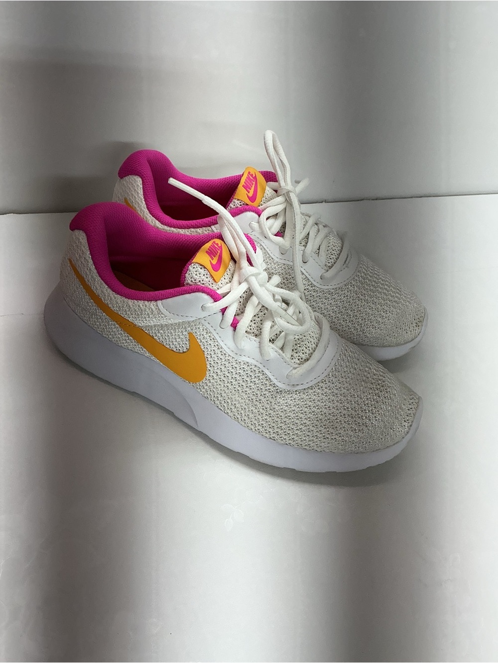 Nike White Mesh Sneakers with Pink Liner and Yellow Swoosh